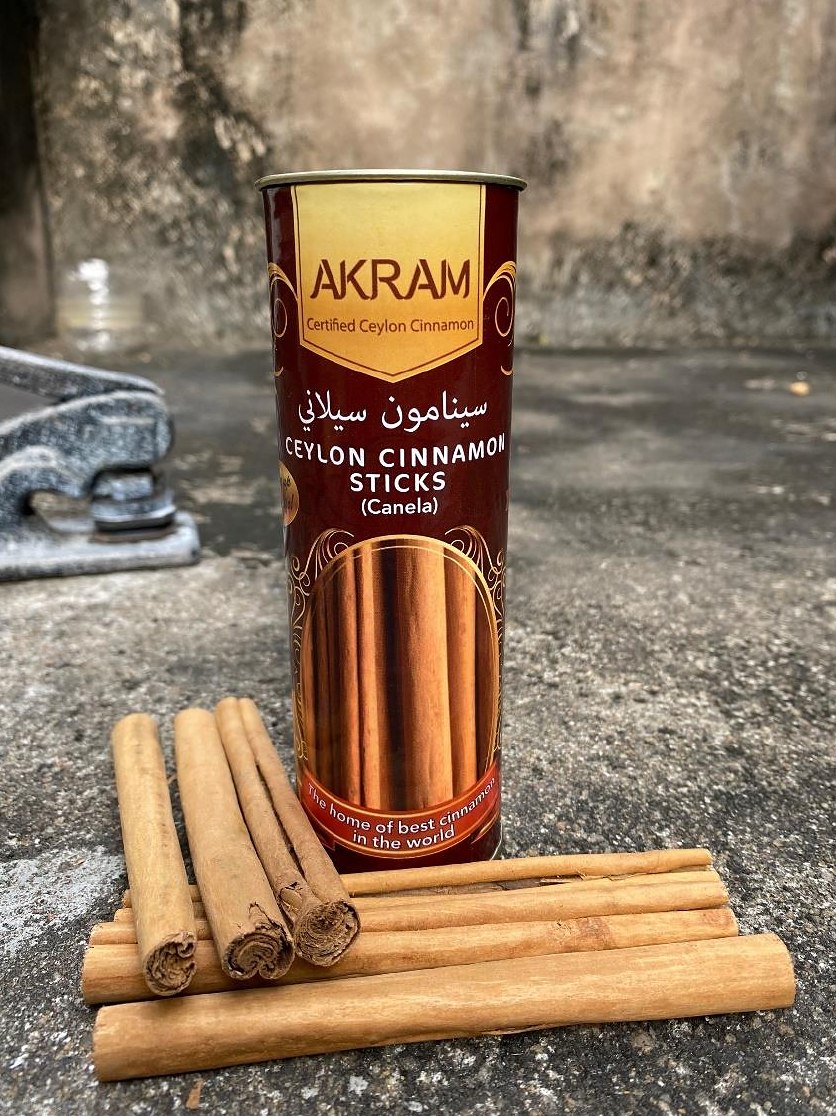 Cinnamon sticks in a customer-branded tin